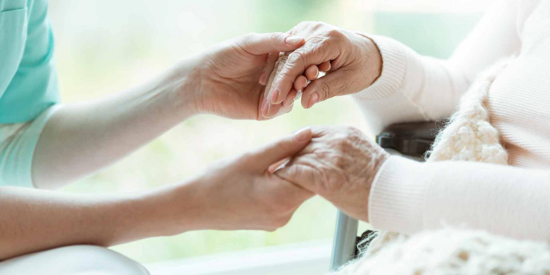 Older Younger Generation Hand Holding Support Aid